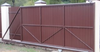 Купить откатные ворота из профнастила Зима, цена от 1781 руб.